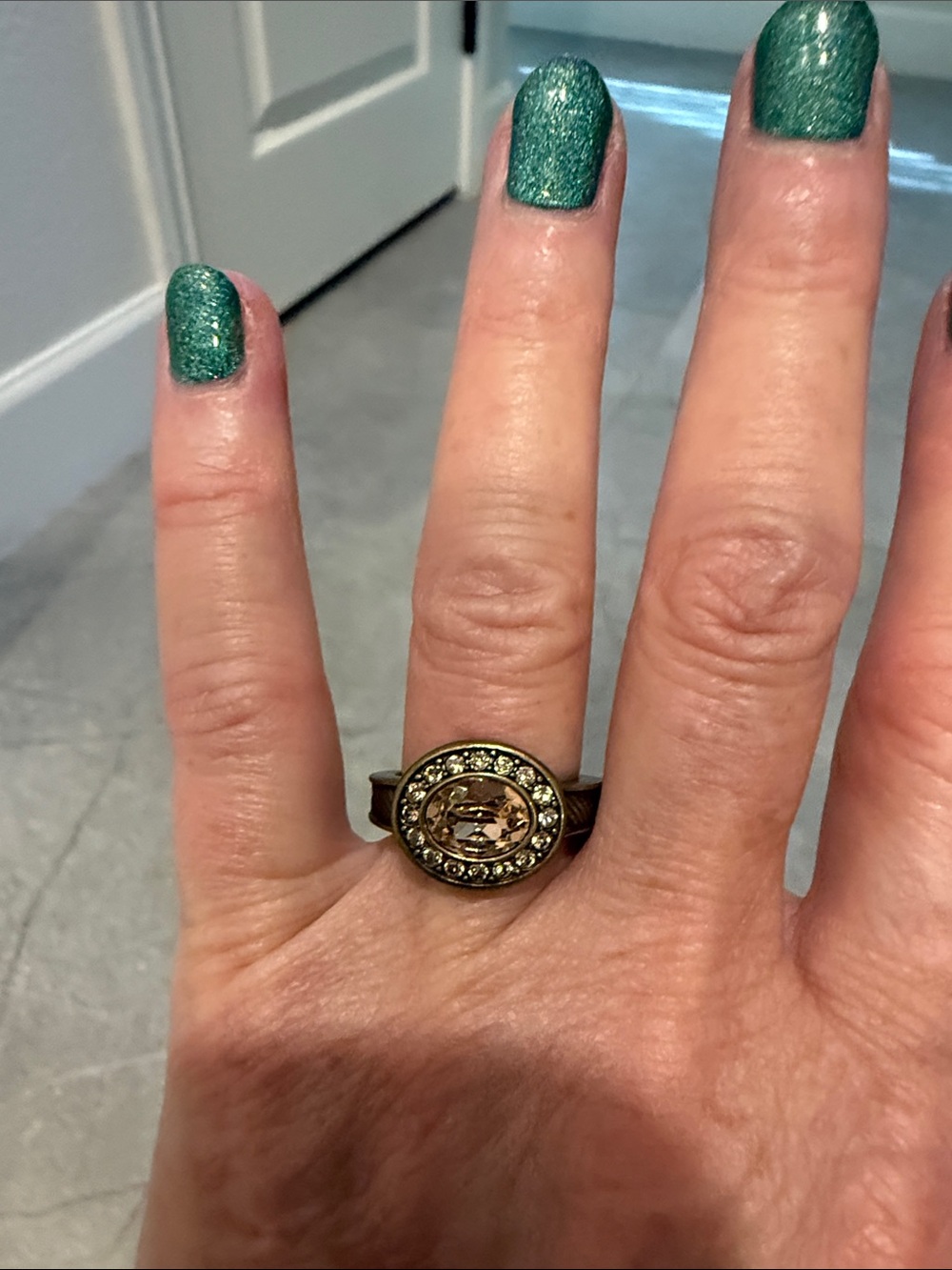 Touchstone Crystal Gold-Tone Oval Coin Ring with Champagne Crystal Center